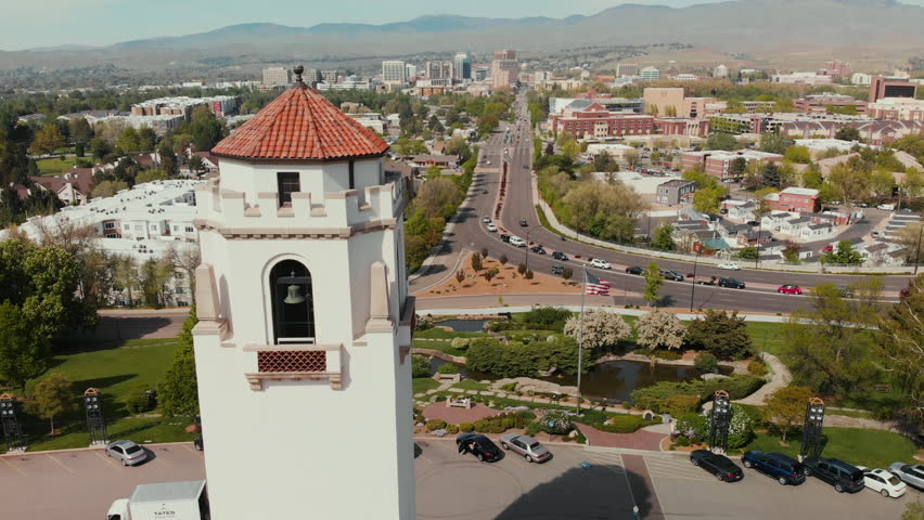 Aerial shot of Boise Depot with downtown and rocky mountain view.