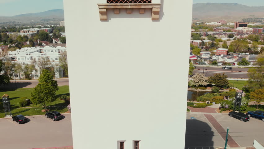 Aerial reveal of downtown Boise with view of rocky mountains