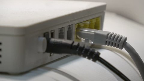 Plugging and Unplugging Ethernet Cable from Router - Detail