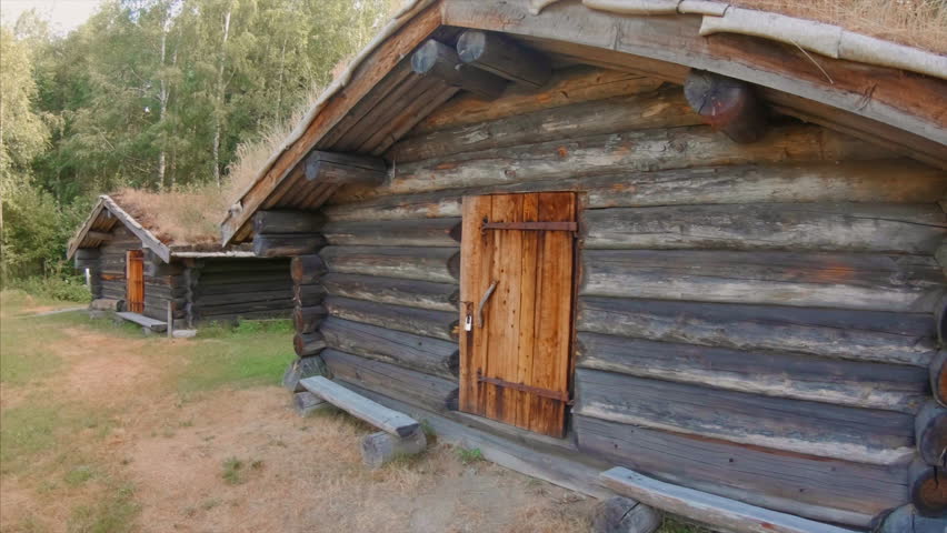 Some old wooden houses with grass roof in Dalarna, Sweden
