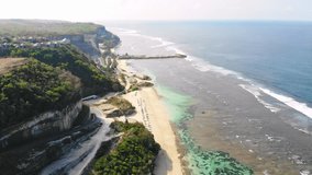 Aerial view with beach and blue ocean in Bali. Melasti beach