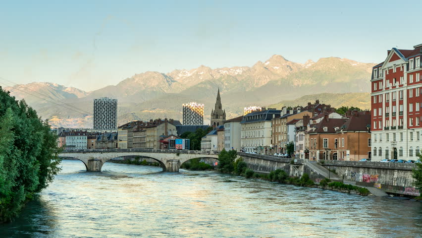 6K Day to night time lapse over Isere river with mountain background in Grenoble, Rhone-Alpes, France