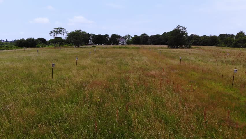 Flying towards New England Colonial Farmhouse
