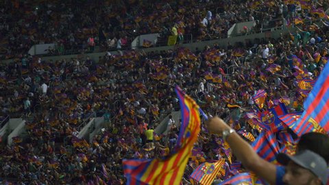 BARCELONA, SPAIN - AUGUST 13, 2017:  Super Cup of Spain, Barcelona 1 Madrid 3 flags and people celebrating