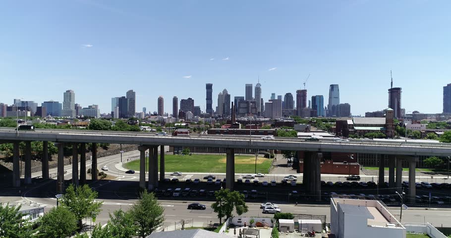 Jersey City highway viaduct crosses neighborhoods below the downtown skyline, 2018.