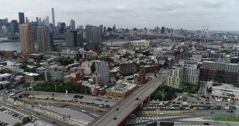 Aerial of Long Island City and surrounding area shot in June of 2018. Long Island City is a redeveloped industrial area along the East River in Queens.