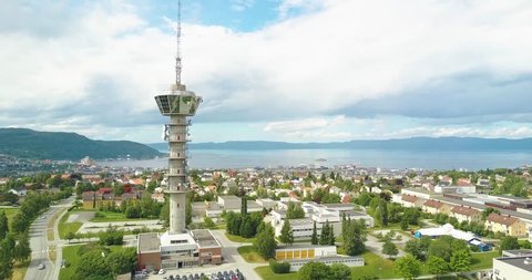Trondheim, Norway - 06 15 2018: Flying by a radiotower