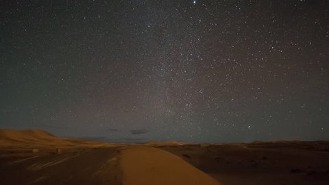 night time timelapse of the stars in the sahara desert morocco