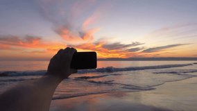 Professional video series of POV taking selfie photo on beautiful sunset in California in 4K slow motion 60fps