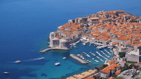 Aerial view at famous european travel destination city Dubrovnik. King's Landing scenery place of Game of Thrones. Location Croatia country, Europe. Discover the beauty of earth. Shooting in 4K video.