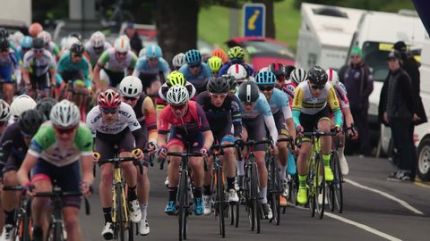 Peloton breaking away on the Tour of the Great South Coast August 14, 2016 - Portland Australia. Filmed in high-speed slow-motion on the PMW-F5.  25P version also available in our portfolio.