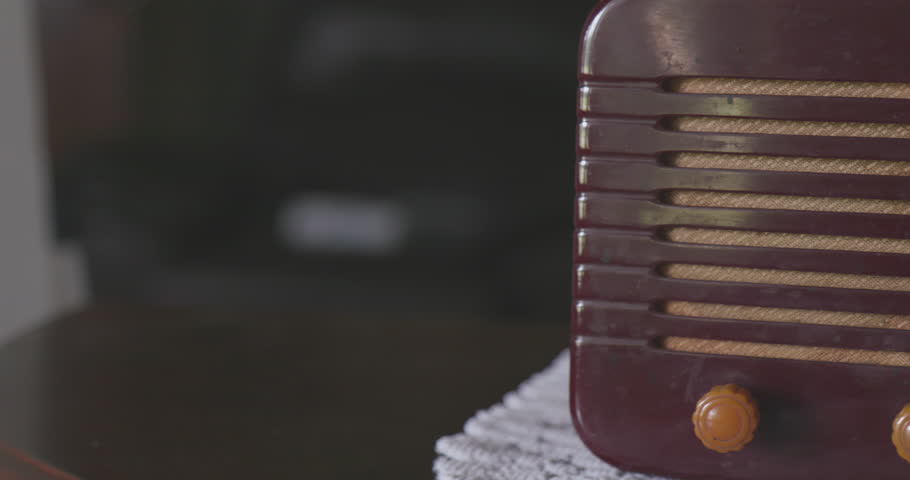 Antique Maroon and Orange Radio on Wooden Table