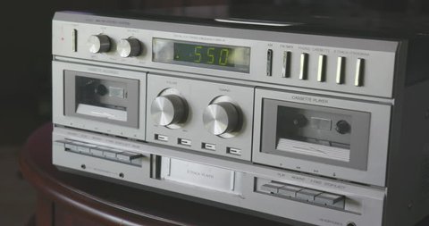 Adjusting AM/FM Radio on Vintage Silver Stereo System