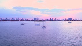 Aerial Miami Beach sailboats in Biscayne Bay sunset