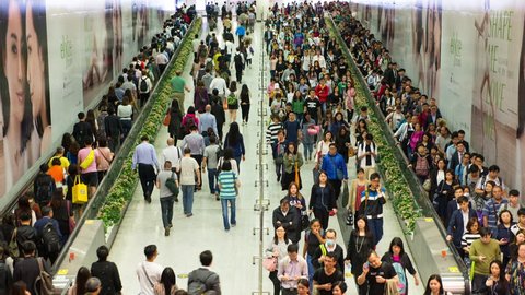 4K Time Lapse - Busy Metro Train / Subway MTR Station - Hong Kong - Circa September 2017