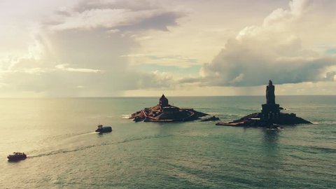 kanyakumari magical shot of temple island and statue island in the sea with tourism boat