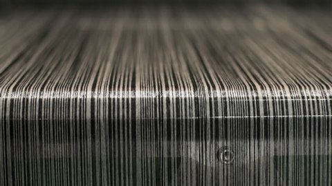 Close up on machine weaving Cashmere in Scotland.