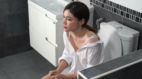 Girl Sitting Toilet Stock Video Footage 4k And Hd Video Clips