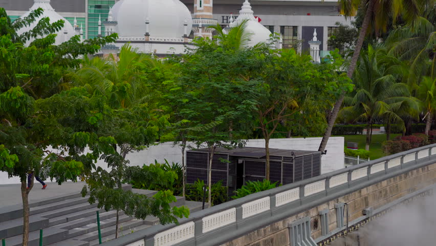handheld shot of the Masjid Jamek mosque nearby the Merdeka Square, Kuala Lumpur, Malaysia