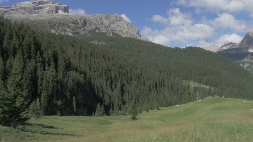 Cyclists on road between Corvara and Arabba, Alta Badia, Province of Belluno, Italian Dolomites, Italy, Europe