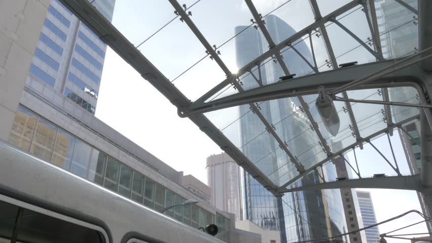 View of trams near Courthouse Park and buildings on 7th Avenue, Calgary, Alberta, Canada, North America