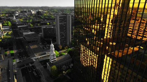 Hartford, Connecticut / United States - 08 15 2017: HARTFORD - CONNECTICUT - 2017: A fly over of the city of Hartford. Capturing the Gold Building on Gold St.