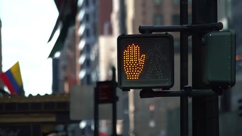 Keep walking New York traffic sign with illuminated and blurred background