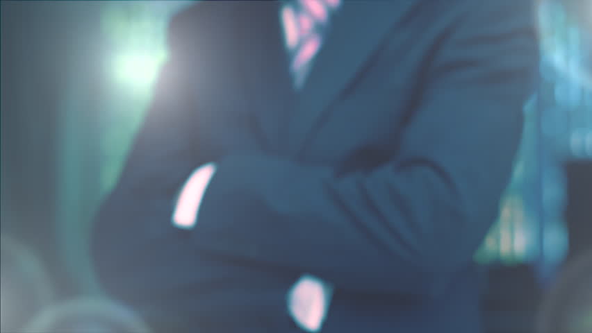 A businessman's hand selecting a Fake News concept button on a futuristic computer screen. Royalty-Free Stock Footage #1013802191