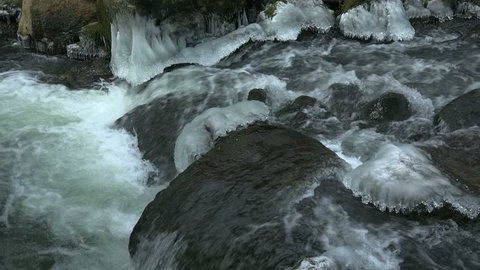 Ice sculptures of Pruem River at Irrel Waterfalls, South Eifel, Rhineland-Palatinate, Germany, Europe