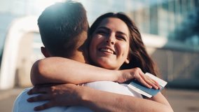 The long-awaited meeting at the airport loving couple. Love and hug each other. Meeting of two loving people. Slow motion - Powered by Shutterstock - Get 15% off with code: PIKWIZARD15