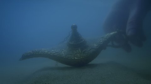 Lamp In Sand Underwater Picked Up