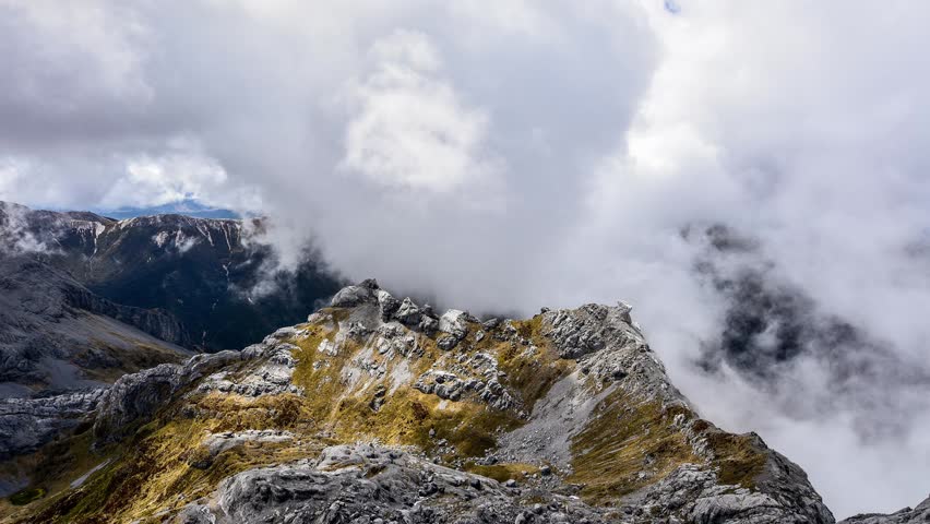 clouds rolling over ridge below Mt Owen New Zealand
