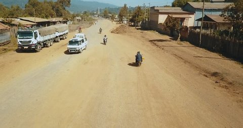 Aerial of rural African street traffic