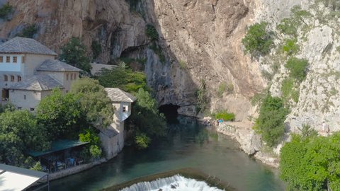 Small village Blagaj on Buna and source of water from the big amazing rock, waterfall,  Bosnia and Herzegovina