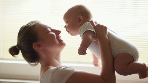 Young Mother Holding Her Newborn の動画素材 ロイヤリティフリー Shutterstock