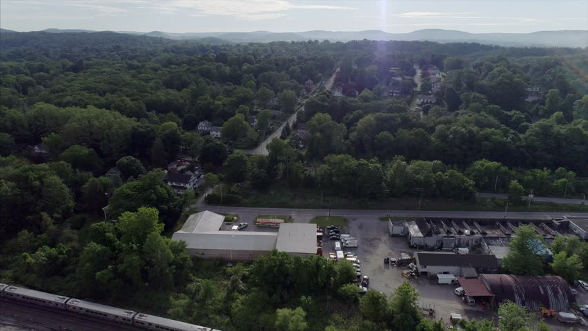 View of Brewster New York, Moving Train in Seen From a Distance
