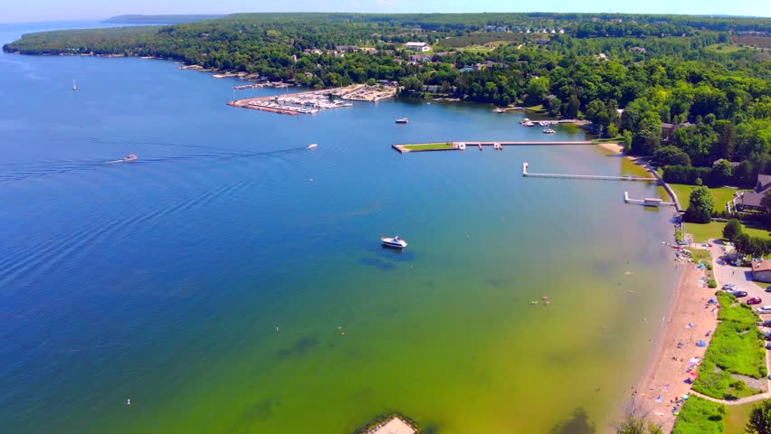 Beautiful Northern Wisconsin beach and harbor on Summer day, aerial view.
