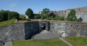 4K high quality summer morning aerial video of Helsinki Baltic Sea Finnish Bay lagoon area, Suomenlinna Island with forts and King's Gate tower near the capital of Finland Suomi, northern Europe
