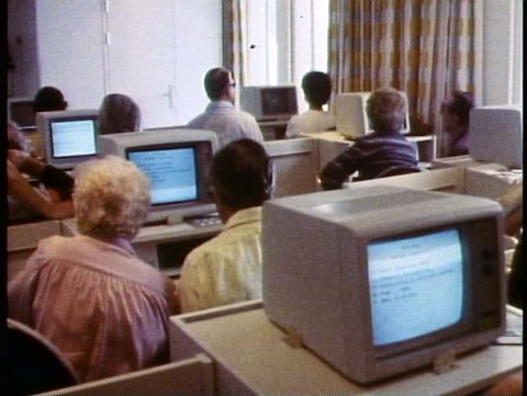 QUEEN ELIZABETH 2, 1985, QE2 computer learning center, 1985, medium shot