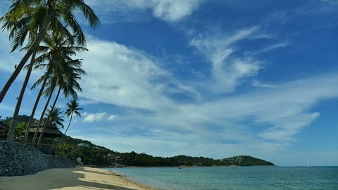 Nature with tropical sea and beach on white cloud and blue sky
