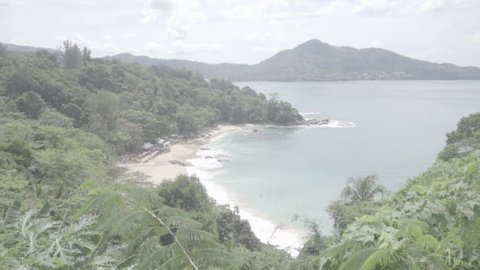 Scenic view from above on a snow-white sandy beach and tropical island. The azure quiet sea washes the islands. S-log, ungraded