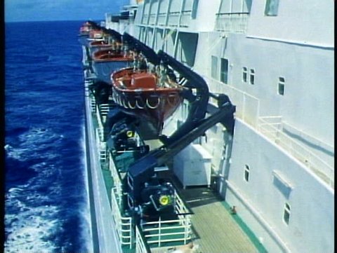 QUEEN ELIZABETH 2, 1985, QE2 side of ship, at sea, bridge wing, stack, ocean