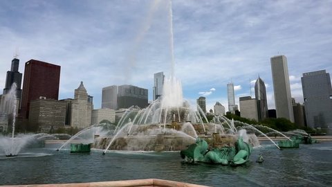 Static Shot of Buckingham Fountain in Chicago, IL. Sunny day with Chicago Skyline in the background