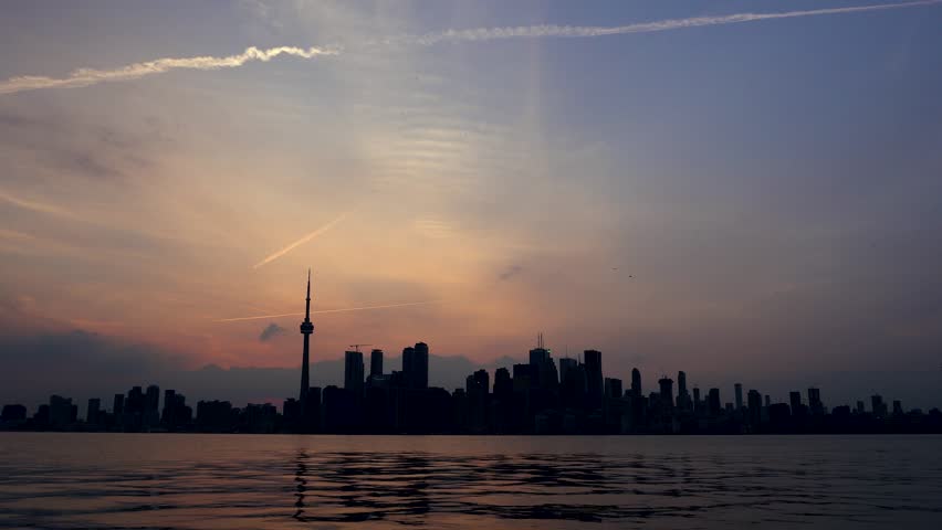 A short timelapse in the evening of the city of Toronto from across Lake Ontario on the Toronto Island.