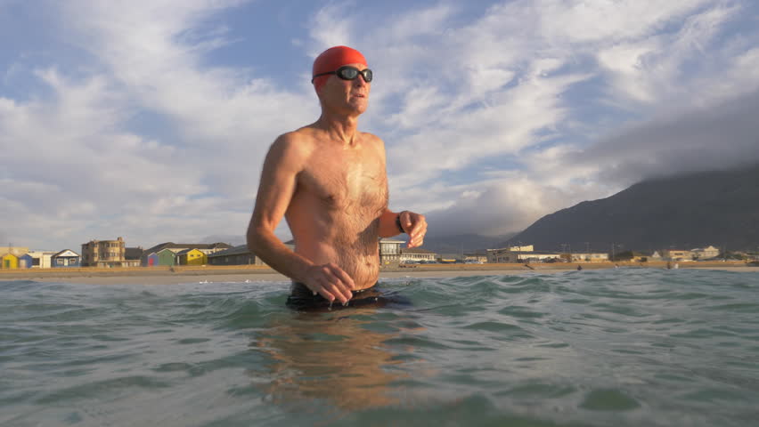 Senior man swimming in the sea Royalty-Free Stock Footage #1013894276