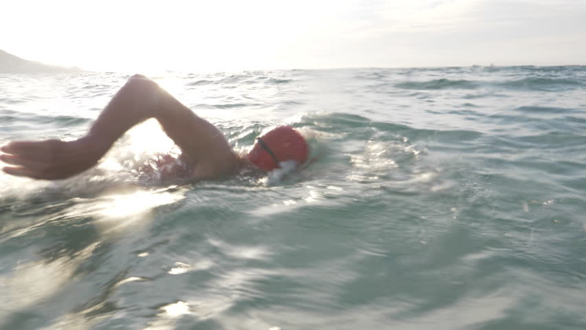 Senior man swimming in the sea Royalty-Free Stock Footage #1013894285