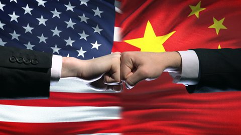 US vs China conflict, international relations crisis, fists on flag background