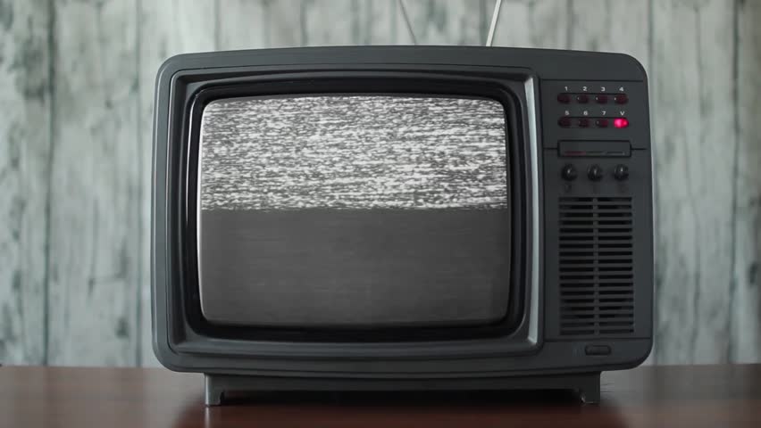 No signal just noise on a small TV in a room Royalty-Free Stock Footage #1013914835