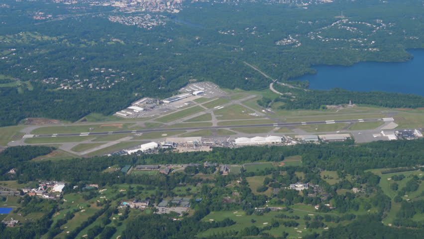 An aerial flyover view of the Westchester County Airport in Connecticut.  	