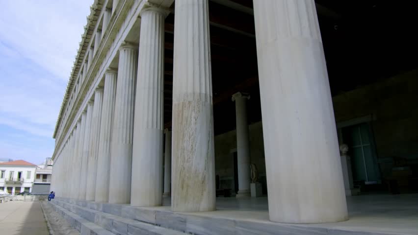 Tracking shot camera moves slowly forward from exterior to the interior of Stoa of Attalos in Athens